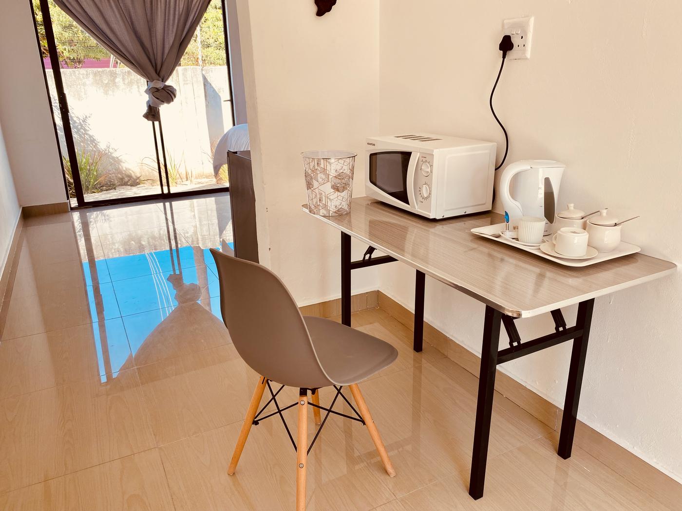 Sinlu Guest House deluxe room with garden access